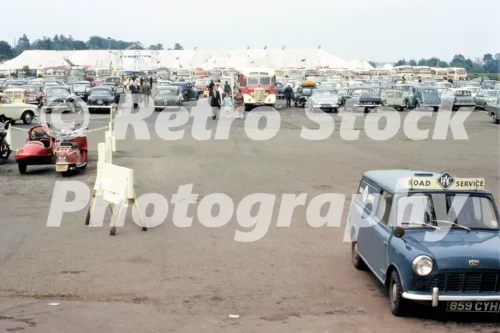 RAC Mini van 859 CYH at Bridgefoot car park Stratford-upon-Avon 1964, Exhibition tent and 1960s vehicles.