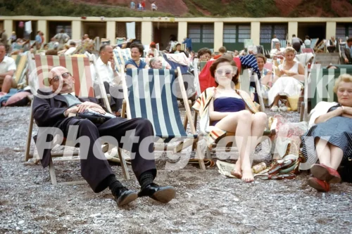 Grandad asleep on the beach 1950s - Vintage photo