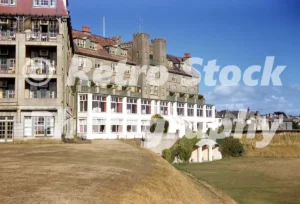Grenville Hotel in Bude, Cornwall with multi-storey seaside hotel buildings and lawns, 1959