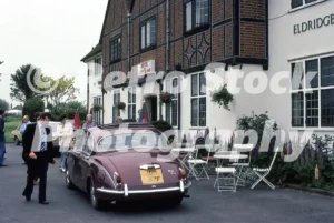 Cribbage Hut Hotel in Sutton Mandeville with a Daimler SP250, 1970s