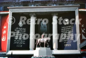 A 1950s colour photo of the grand Coronation display at Selfridges on Oxford Street in 1953, featuring a central equestrian statue of Queen Elizabeth II on her horse Winston.