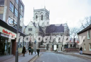1970s view along Wellowgate in Grimsby towards Grimsby Minster and Church Lane