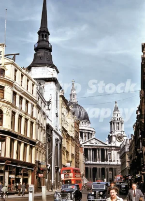 A 1950s colour photo of Ludgate Hill in London, featuring St Paul's Cathedral in the background and a busy street with vintage vehicles.