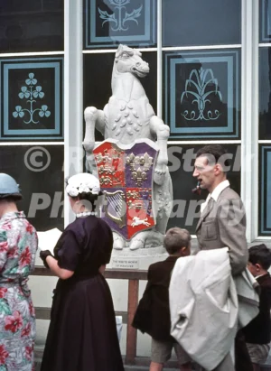 A 1950s colour photo of James Woodford’s "The White Horse of Hanover" sculpture, part of The Queen's Beasts collection, on display outside the temporary annexe of Westminster Abbey for the 1953 Coronation.