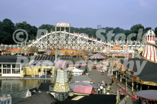 A 1960s colour photo of the Big Dipper roller coaster at the Battersea Park Funfair in London, 1968.