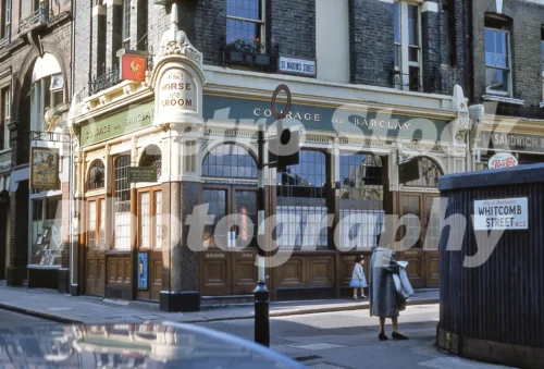 A 1960s colour photo of the ornate Horse & Groom public house on the corner of Whitcomb Street and St Martin's Street in 1960.