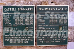 A 1978 photograph of two green informational signs at Beaumaris Castle, one in Welsh and one in English, displaying admission prices of 35p for adults and 17p for children and pensioners.