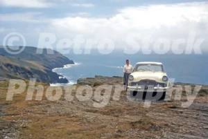 Ford Zephyr parked on cliff at St Agnes, Cornwall in the 1960s