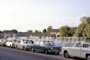 Period cars parked by the Thames at Henley-on-Thames in 1969.
