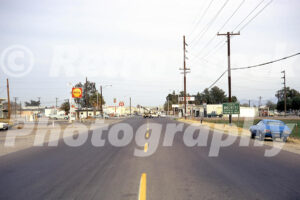 1970s view along the main road in Buckeye, Arizona with roadside businesses