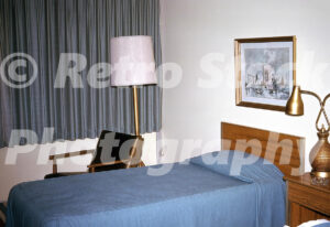 1960s hotel room interior in Atlantic City with twin beds and lamps