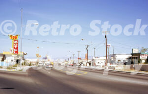 1970s street scene in Winslow, Arizona with the 400 Motel sign