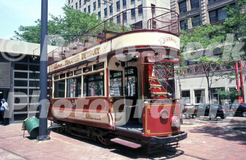 A 1990s colour photo of the red and cream double-decker car no. 14 of the Detroit Citizens Railway parked near Grand Circus Park in 1993.