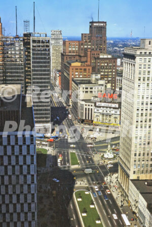 A 1960s color photo of the Woodward and Michigan Avenue intersection and the massive J.L. Hudson’s department store in downtown Detroit in 1964.