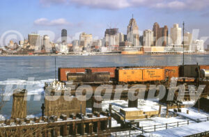 A 1960s color photo of the Detroit skyline viewed across the icy Detroit River from Windsor, Ontario, in 1963.