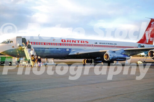 x A 1970s color photo of a Qantas Boeing 707 V-Jet named City of Adelaide at Christchurch Airport, New Zealand in 1972.