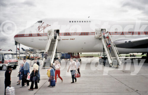 Virgin Atlantic Boeing 747 Maiden Voyager at Gatwick Airport in 1985 with passengers disembarking