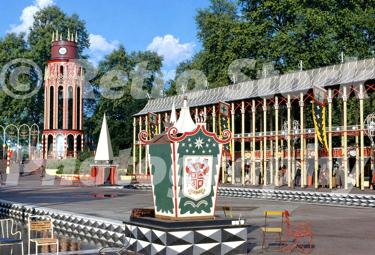 Vintage 1950s colour photo of the Vista Arcades at the Festival Pleasure Gardens in Battersea Park, London, with one of the entrance towers.