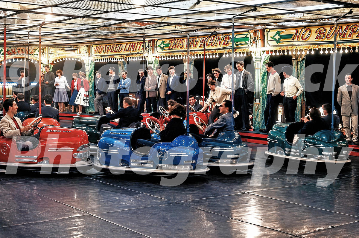 Vintage 1950s colour photo of the Supercar bumper cars at the Festival Pleasure Gardens in Battersea Park, London.