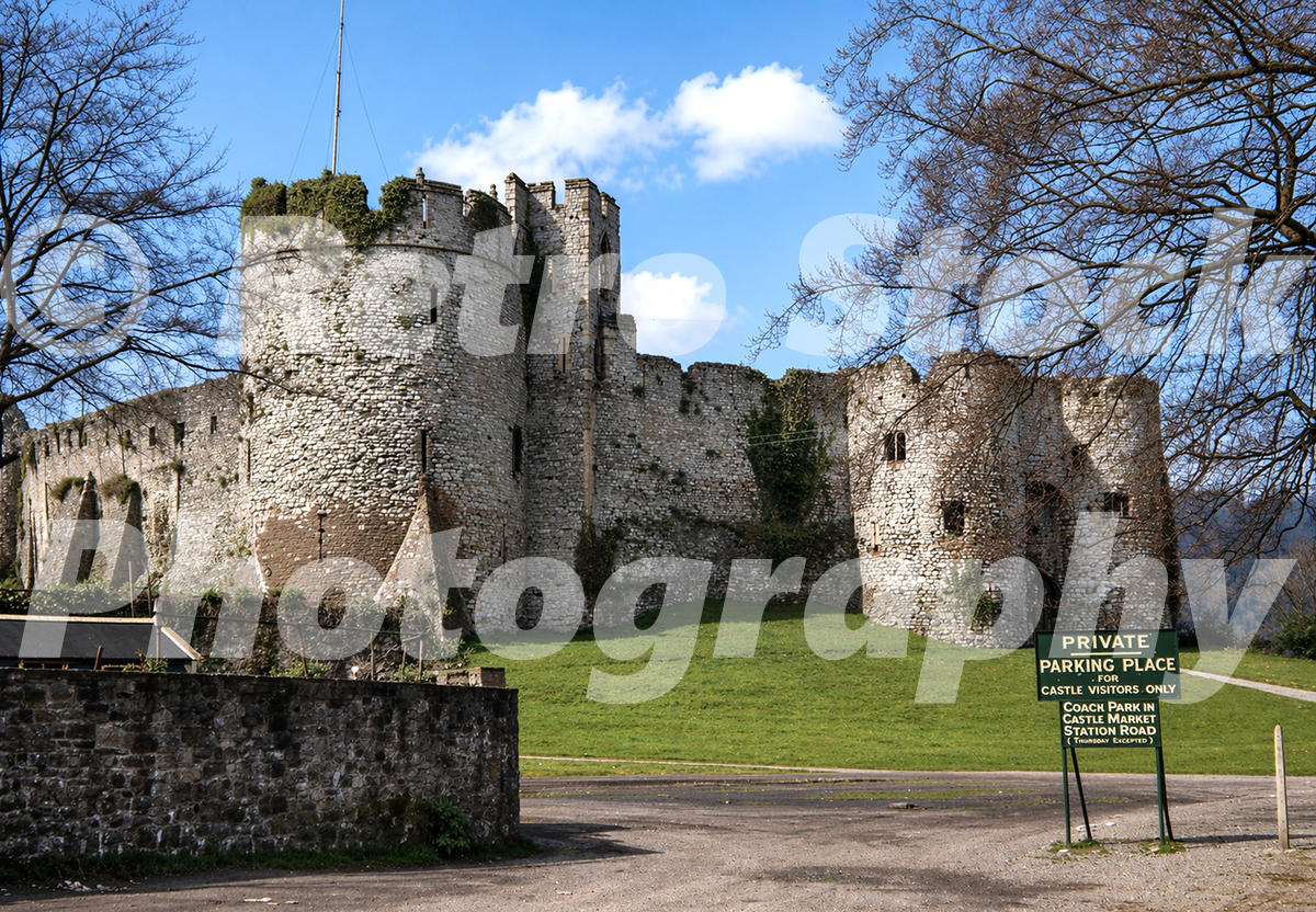 chepstow-castle-1950_55231991789_o 1950s view of Chepstow Castle in Monmouthshire with stone ruins, visitor parking sign and grassy foreground.