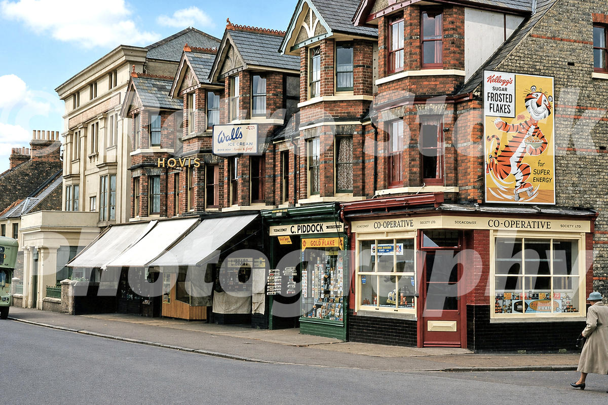 1950s photo of Dover Road in Folkestone at the corner with Grove Road, showing Hovis, Walls Ice Cream, C. Piddock, the Co-operative Society and a large Kellogg’s Sugar Frosted Flakes advert.