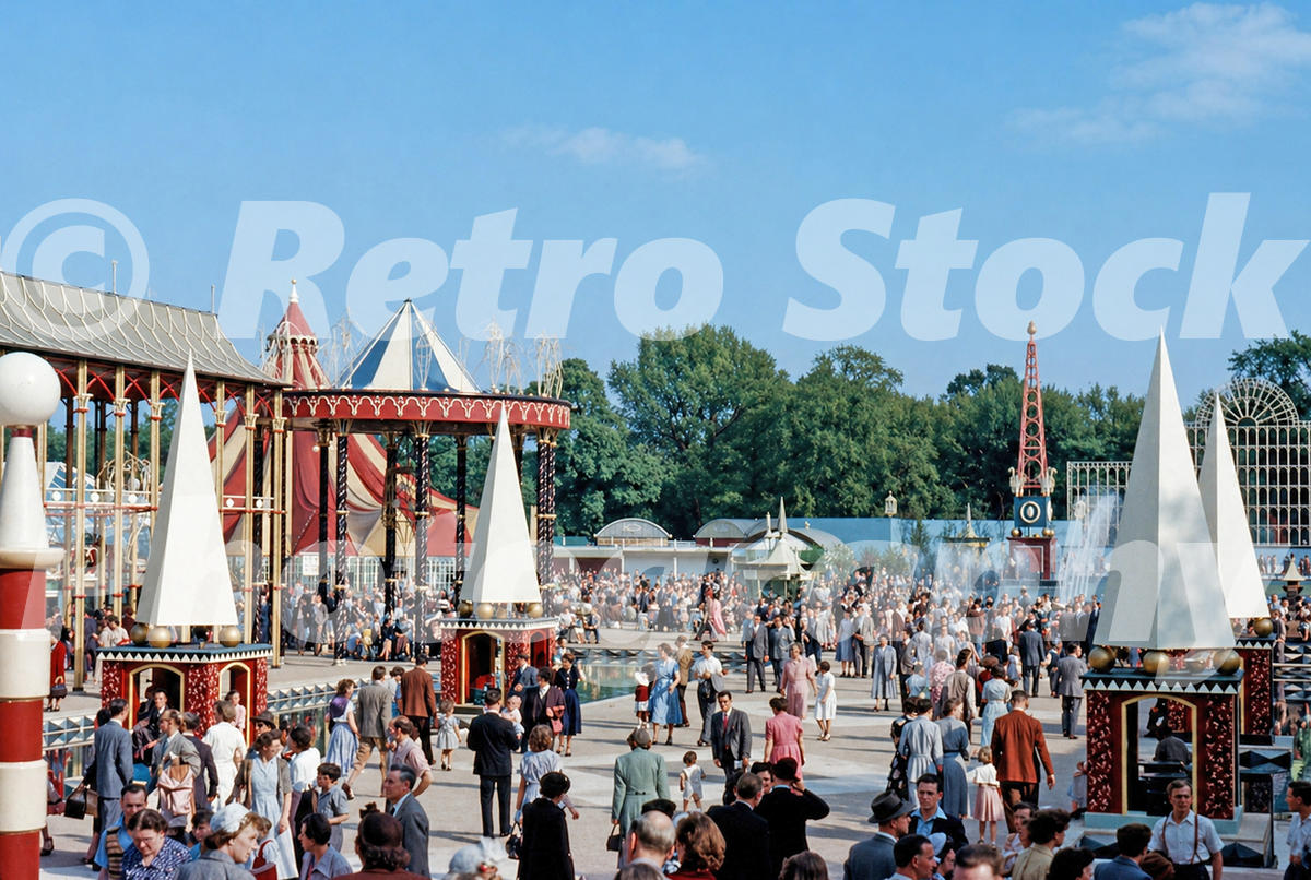 Vintage 1950s colour photo of the Grand Vista at the Festival Pleasure Gardens in Battersea Park, London, looking towards Fountain Lake with crowds.