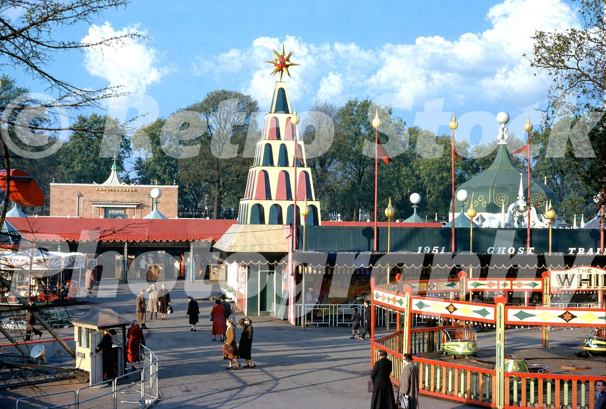 Vintage 1950s colour photo of the Whip and Ghost Train at the Festival Pleasure Gardens in Battersea Park, London.
