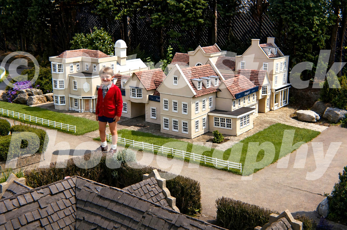 1970s view of Hastings Model Village with miniature houses and visitor