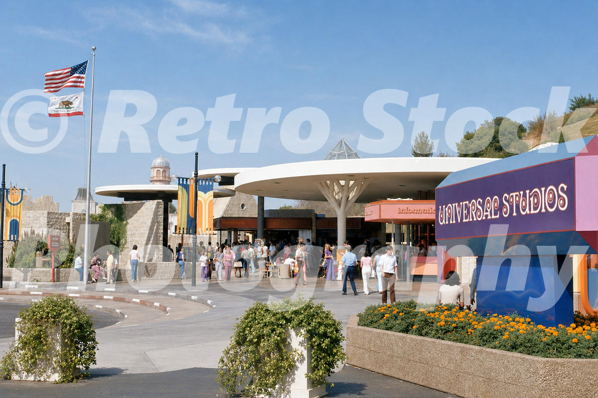 A 1970s color photo of the entrance plaza at Universal Studios Hollywood in California, featuring a large purple and blue "Universal Studios" sign, circular white shade structures, and guests in vintage summer attire.