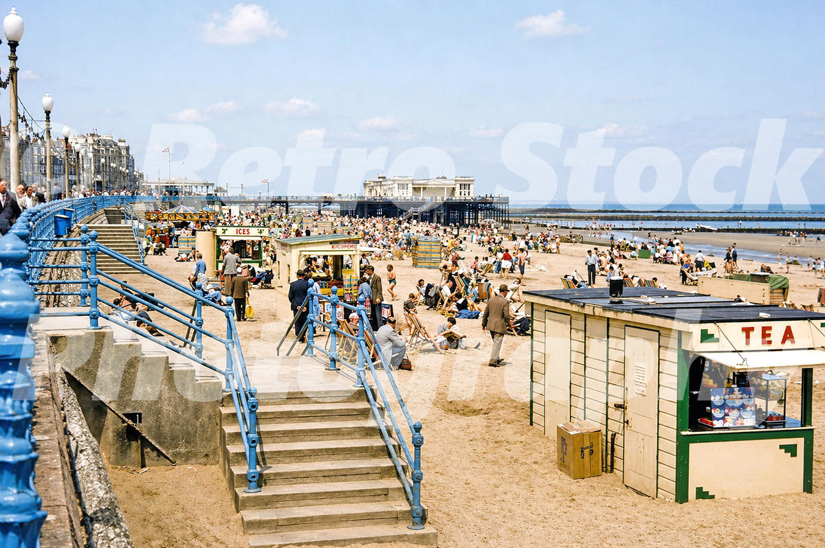 Margate beach in 1956 showing seafront steps, beach kiosks and crowds of holidaymakers on the sand