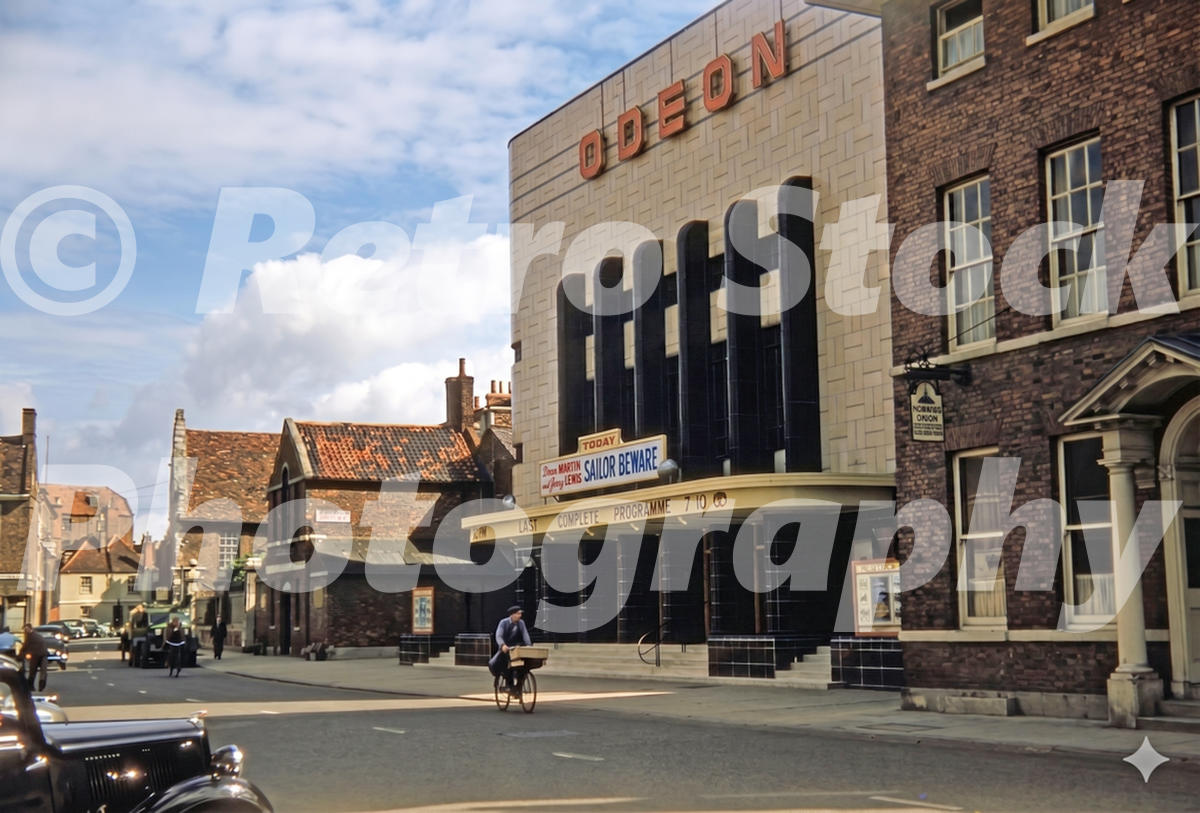 Odeon Cinema on South Square in Boston, Lincolnshire, in the 1950s showing the façade, film posters and street activity