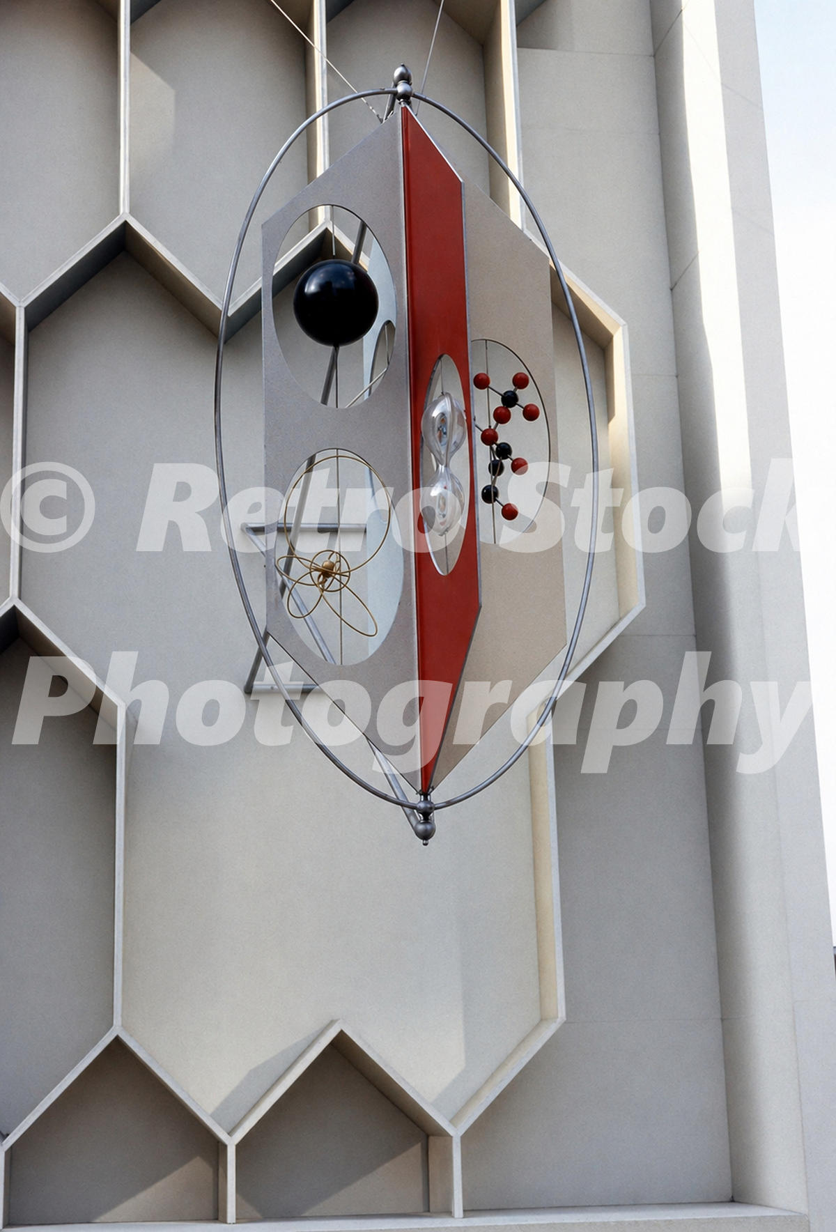 science-museum-festival-of-britain-1951_55239343720_o Vintage 1951 colour photo of an atomic motif on the Exhibition of Science facade at the Science Museum in South Kensington, London, during the Festival of Britain year.