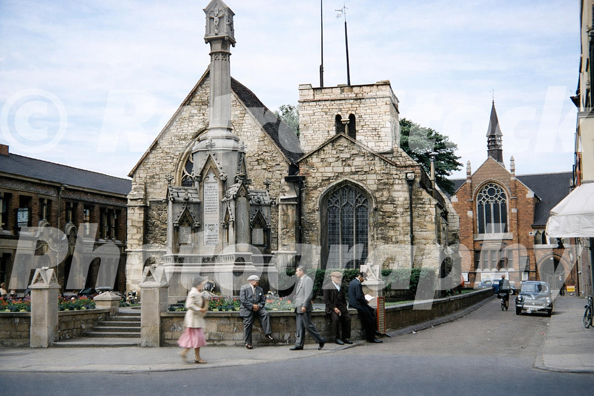 St Benedict’s Square in Lincoln in the 1950s showing St Benedict’s Church, pedestrians and everyday street life