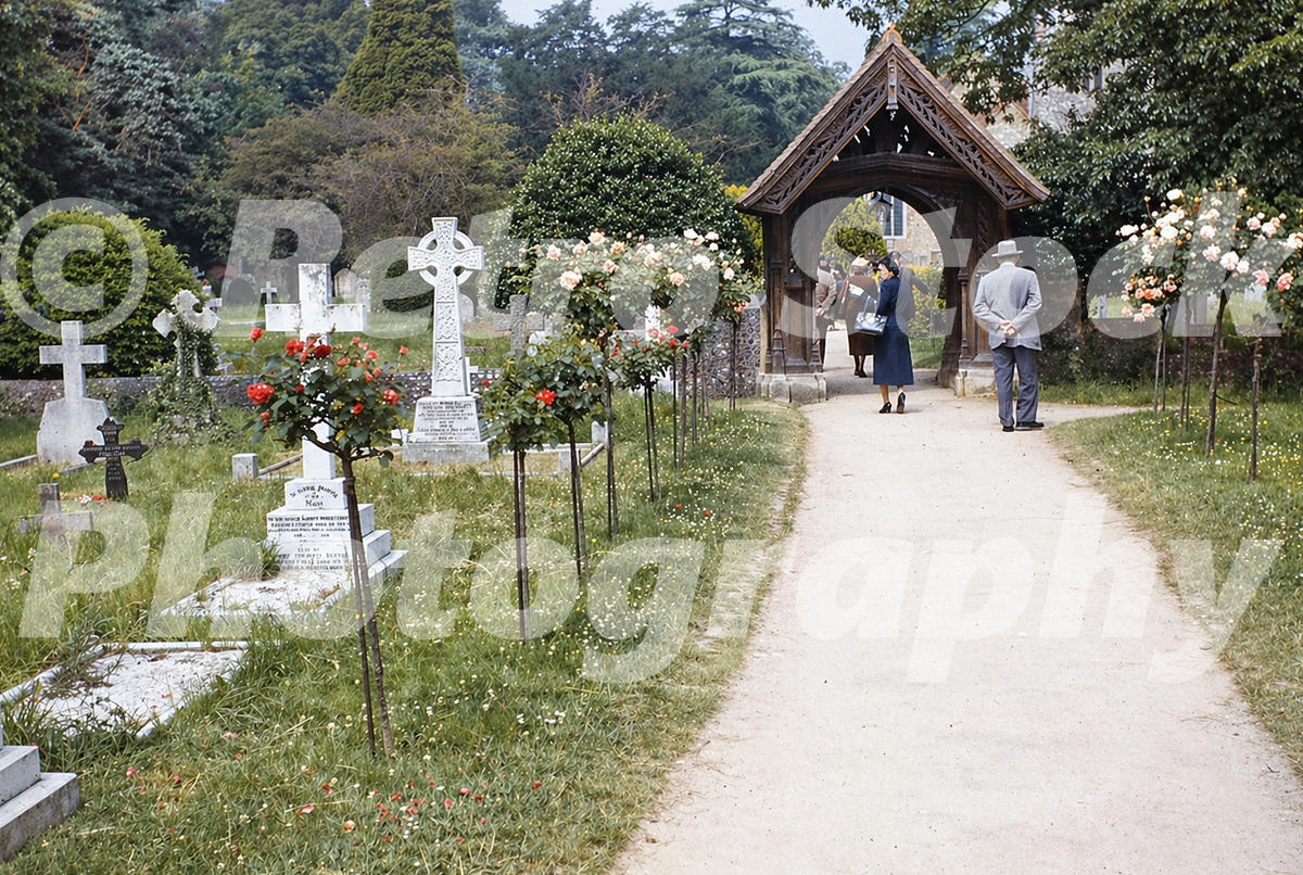 St Giles’ Church, Stoke Poges, in the 1950s showing the churchyard path, gravestones and timber lychgate