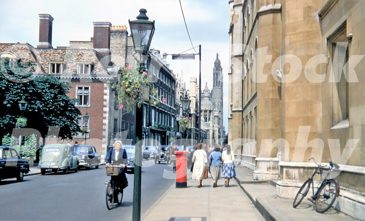 Trumpington Street in Cambridge in the 1950s with cyclists and pedestrians