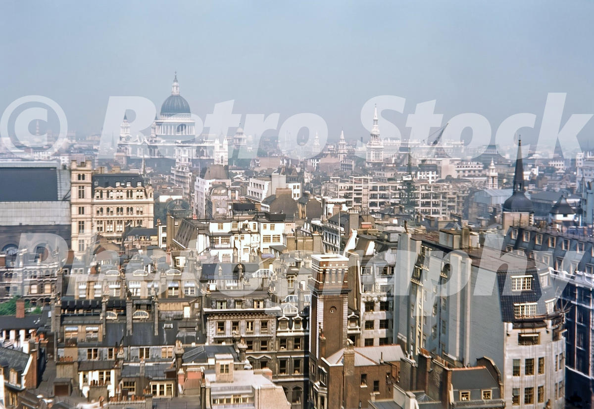 view-from-the-monument-london-1950s_55230829957_o 1950s colour photo looking across the rooftops of the City of London from the Monument towards St Paul’s Cathedral.