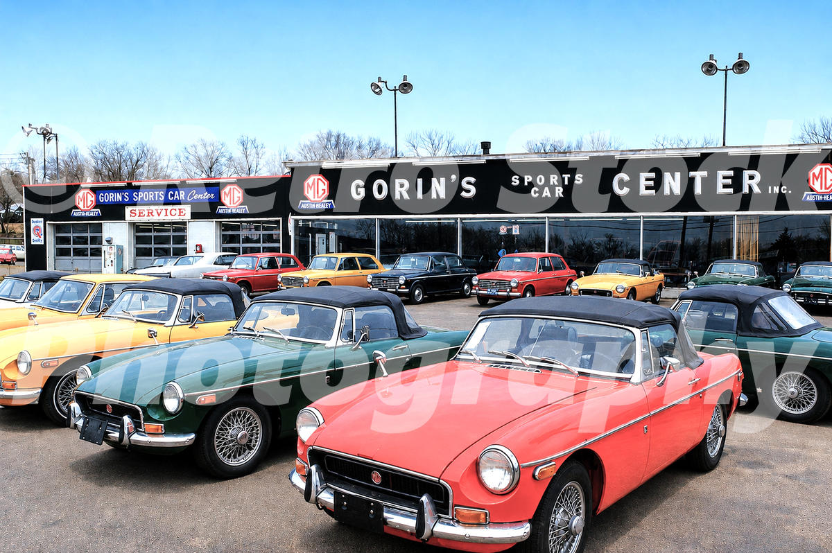 Gorin’s Sports Car Center in Vernon, Connecticut in 1970 with MGB roadsters, Austin America saloons and other British cars outside the dealership