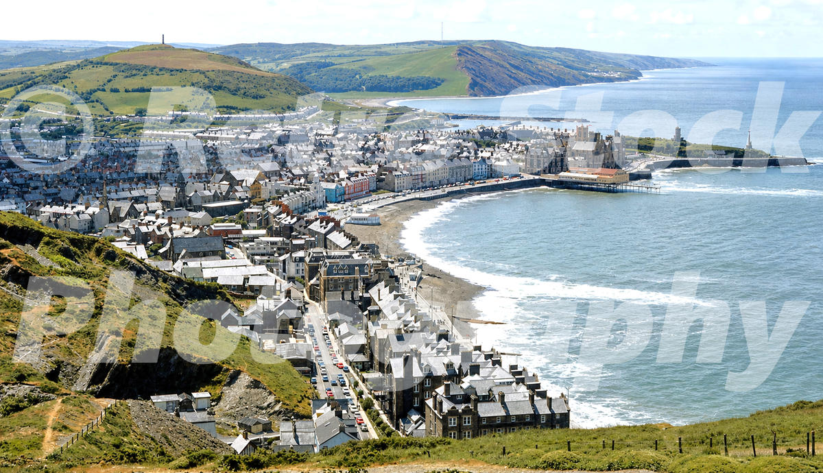 1970s view of Aberystwyth from Constitution Hill, looking over the town, seafront, pier, harbour and Cardigan Bay.