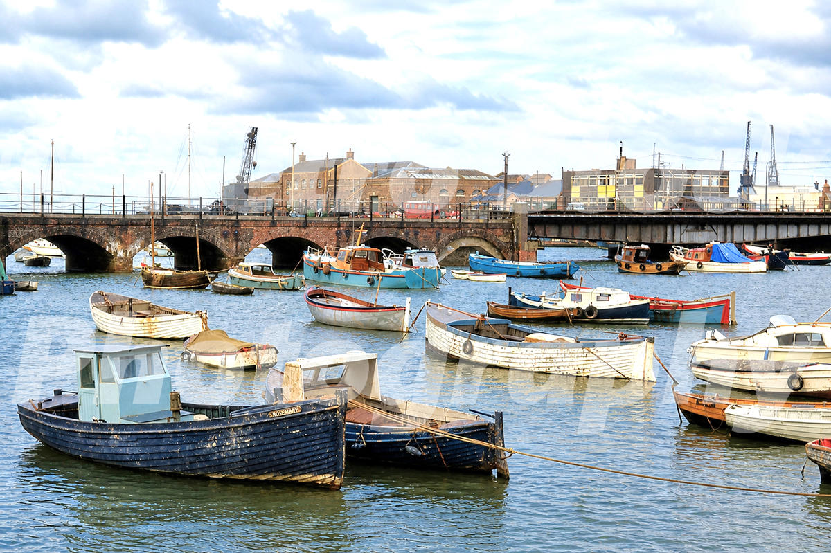 1960s photos of former wooden lifeboats and small boats at Folkestone Harbour