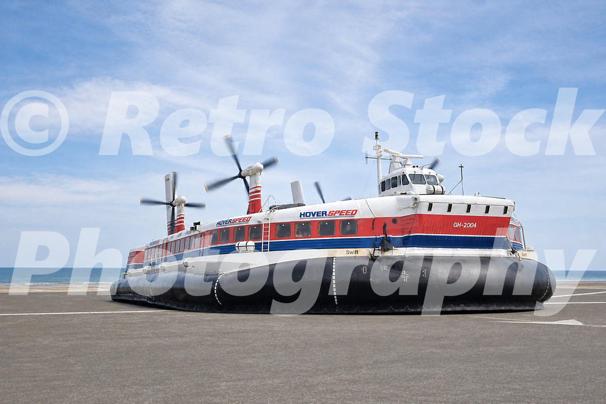 hoverspeed-srn4-hovercraft-swift-seen-in-1990_55261063770_o 1990s photo of the Hoverspeed SR.N4 hovercraft Swift on its landing pad with its four propellers turning.