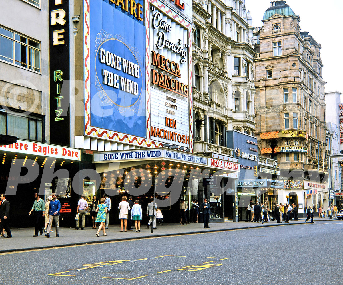 leicester-square-london-1969_55242253722_o A 1960s colour photo of the bright neon signage and cinema marquees of the Empire Ritz and Mecca Dancing on Leicester Square in 1969.